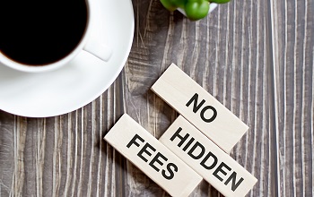 No hidden fees word written on wood block. No hidden fees text on wooden table for your desing, Top view concept, local movers